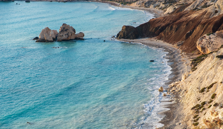 Bird's eye view of Petra tou Romiou rock on a beautiful afternoon, considered to be Aphrodite's birthplace in Greek mythology. This is a famous tourist travel destination landmark in Paphos, Cyprus.の写真素材