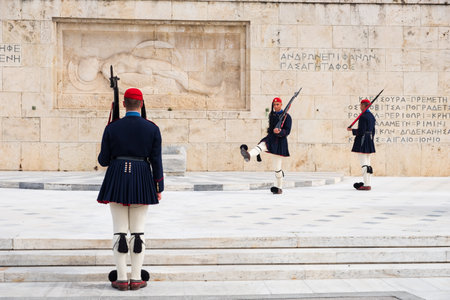 Athens, Greece - March 9, 2019: Changing of the presidential guard called Evzones in front of the Monument of the Unknown Soldier, next to the Greek Parliament, Syntagma squareのeditorial素材