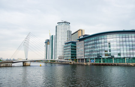 Manchester, United Kingdom - April 24, 2019: view of modern architectural buildings at the Salford Quays on the banks of the Manchester Ship Canal in Salford and Trafford, Greater Manchesterのeditorial素材