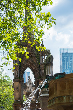 Manchester, United Kingdom - July 7, 2019: Water fountains, John Bright Statue and Albert Memorial at the Manchester Town Hall in Manchester, United Kingdomのeditorial素材