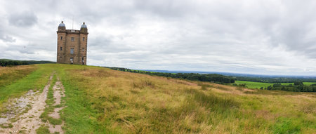 The Cage tower and surrounding landscape in the distance, Peak District, Cheshire, UKのeditorial素材