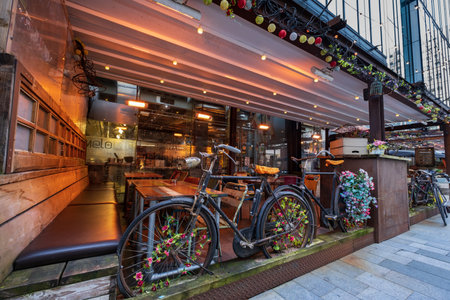Manchester, United Kingdom - November 29, 2019: Street view of Spinningfields, a modern area was specially developed in the 2000s as a business, retail and residential development of Manchester.のeditorial素材