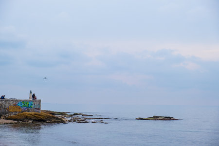 Athens, Greece - January 26, 2020: Paleo Faliro seafront on a cloudy and misty winter day.のeditorial素材
