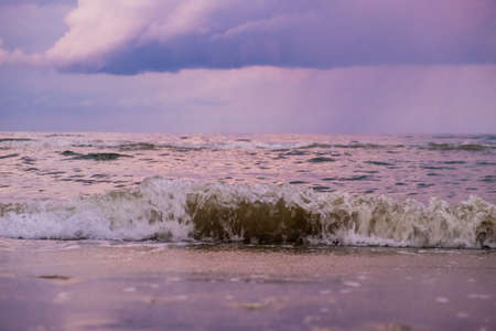 Blue hour on a stormy day at McKenzie beach, Larnaca, island of Cyprusの写真素材