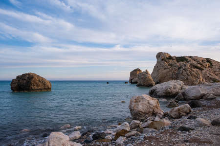 Beautiful afternoon view of the rocks and beacharound Petra tou Romiou, in Paphos, Cyprus. It is considered to be Aphrodite's birthplace in Greek mythology.の写真素材