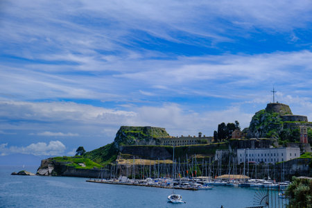 Old Fortress of Corfu island in Corfu Town in Greece with Sail Boats in the foregroundのeditorial素材