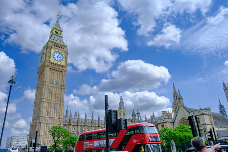 The big Ben and a Red Double Decker Bus in London in the UK