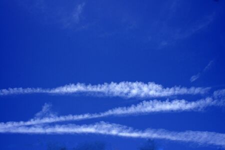 contrails before becoming clouds                   の写真素材