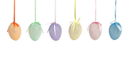 Easter eggs with different theme isolated on white backgroundの写真素材