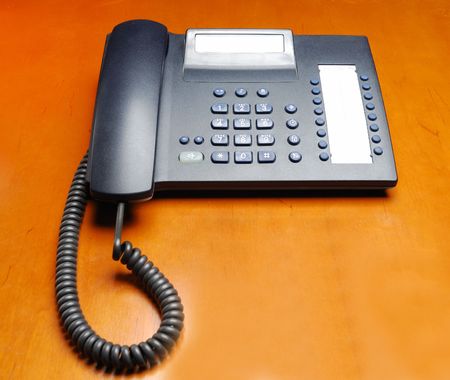 Business phone on the tableの写真素材