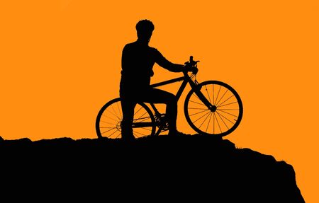 Photo of biker silhouette in sunsetの写真素材