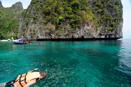 Snorkeling vacation at beautiful beach / island の写真素材