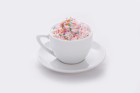 cappuccino latte in chashkes colored marmalade on white backgroundの写真素材