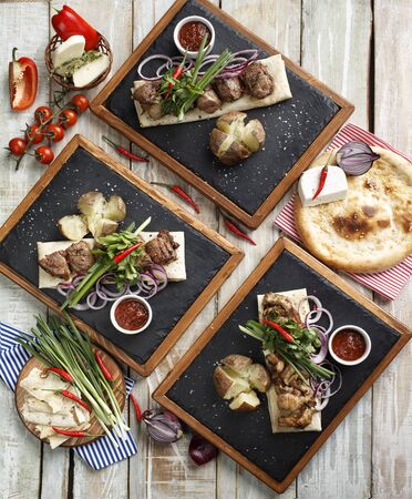 various kebabs on the wooden tableの写真素材