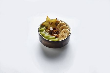 cereal with fruits and berries on a white backgroundの写真素材