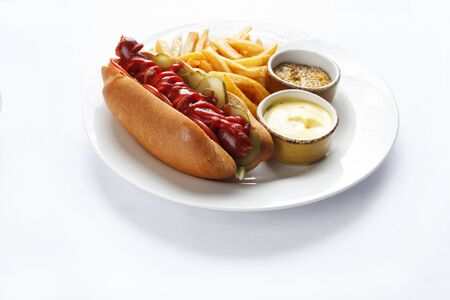 hotdog and french fries on white backgroundの写真素材