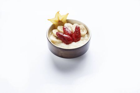 cereal with fruits and berries on a white backgroundの写真素材