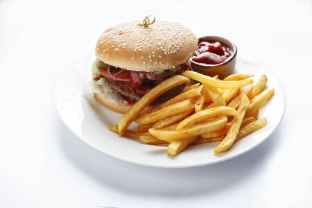burger and french fries on white backgroundの写真素材