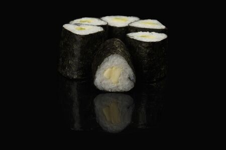 various sushi, rolls on a black background with reflection. especially for cafes and restaurantsの写真素材