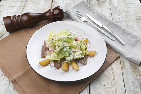 salad of beef and potato wedgesの写真素材