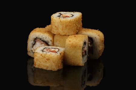 various sushi, rolls on a black background with reflection. especially for cafes and restaurantsの写真素材