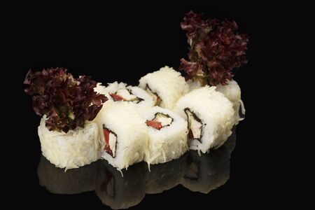 various sushi, rolls on a black background with reflection. especially for cafes and restaurantsの写真素材