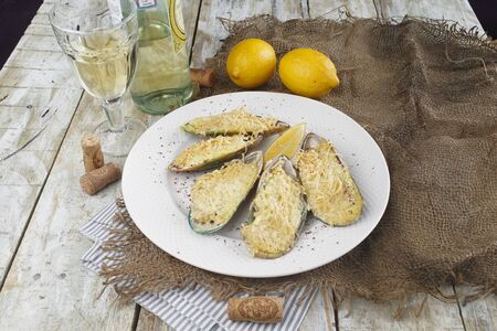 baked mussels with cheeseの写真素材