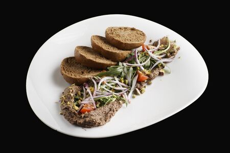 liver pate and black bread toastの写真素材