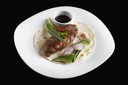 Roasted duck with pear,marinated in red wineの写真素材