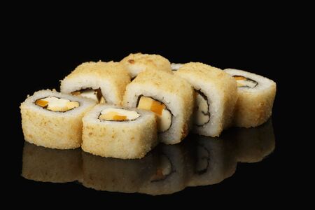 various sushi, rolls on a black background with reflection. especially for cafes and restaurantsの写真素材