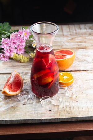 cocktail in a glass on a wooden table. selective focusの写真素材