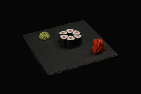 various sushi, rolls on a black background with reflection. especially for cafes and restaurants on a black backgroundの写真素材