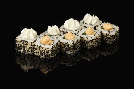 various sushi, rolls on a black background with reflection. especially for cafes and restaurants on a black backgroundの写真素材