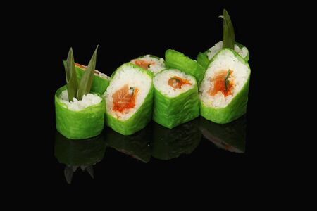 various sushi, rolls on a black background with reflection. especially for cafes and restaurantsの写真素材