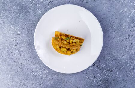 tacos in a plate on a gray background. view from above. specially for restaurantsの写真素材