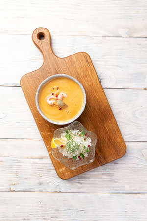 Traditional soup tom yum. On a light background. Selective focus