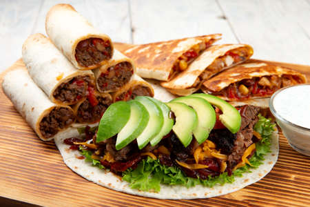 set of mexican appetizers on the board. selective focus