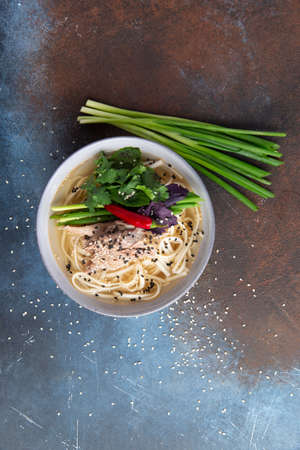 Traditional soup with chicken noodles and herbs. Selective focusの写真素材