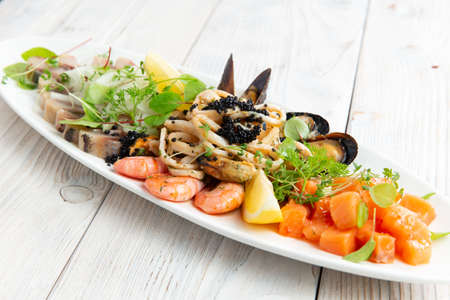 Assorted seafood products. On a light background. selective focus.