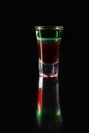 layered cocktail. on a dark background. selective focus.の写真素材