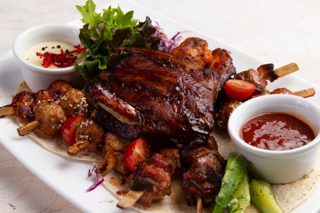 Assorted grilled meats. On a light background. selective focus.の写真素材