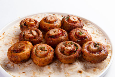 Grilled champignon mushrooms. On a white background. selective focus.の写真素材