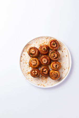 Grilled champignon mushrooms. On a white background. selective focus.の写真素材