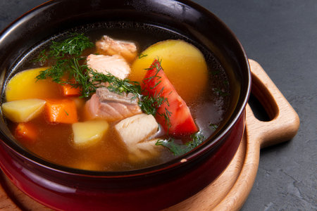 Traditional fish soup. Ear. On a dark background.の写真素材