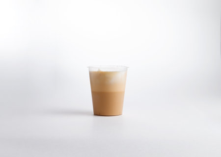 Cappuccino coffee in a cup. on a white background. Selective focus.の写真素材