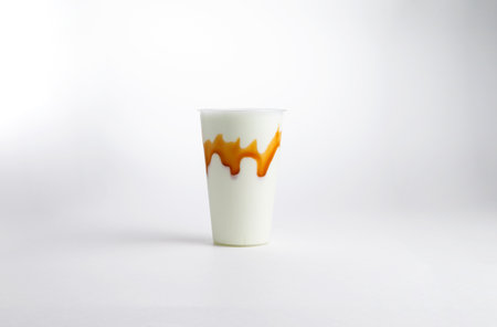 Milkshake in a glass. on a white background. Selective focus.の写真素材