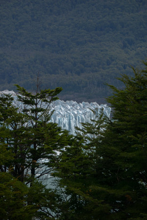Impressive vertical photo of the Perito Moreno Glacier located in the Andes Mountains in Patagonia Argentinaの写真素材
