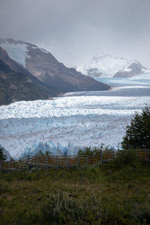 Impressive vertical photo of the Perito Moreno Glacier located in the Andes Mountains in Patagonia Argentinaの写真素材