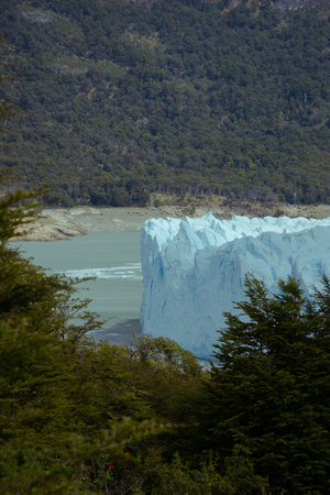 Impressive vertical photo of the Perito Moreno Glacier located in the Andes Mountains in Patagonia Argentinaの写真素材