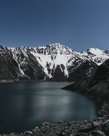 Impressive horizontal photo of the Embalse El Yeso, located in San Jose de Maipo known as El Cajon del Maipo in the Andes Mountains, Chilean Patagoniaの写真素材